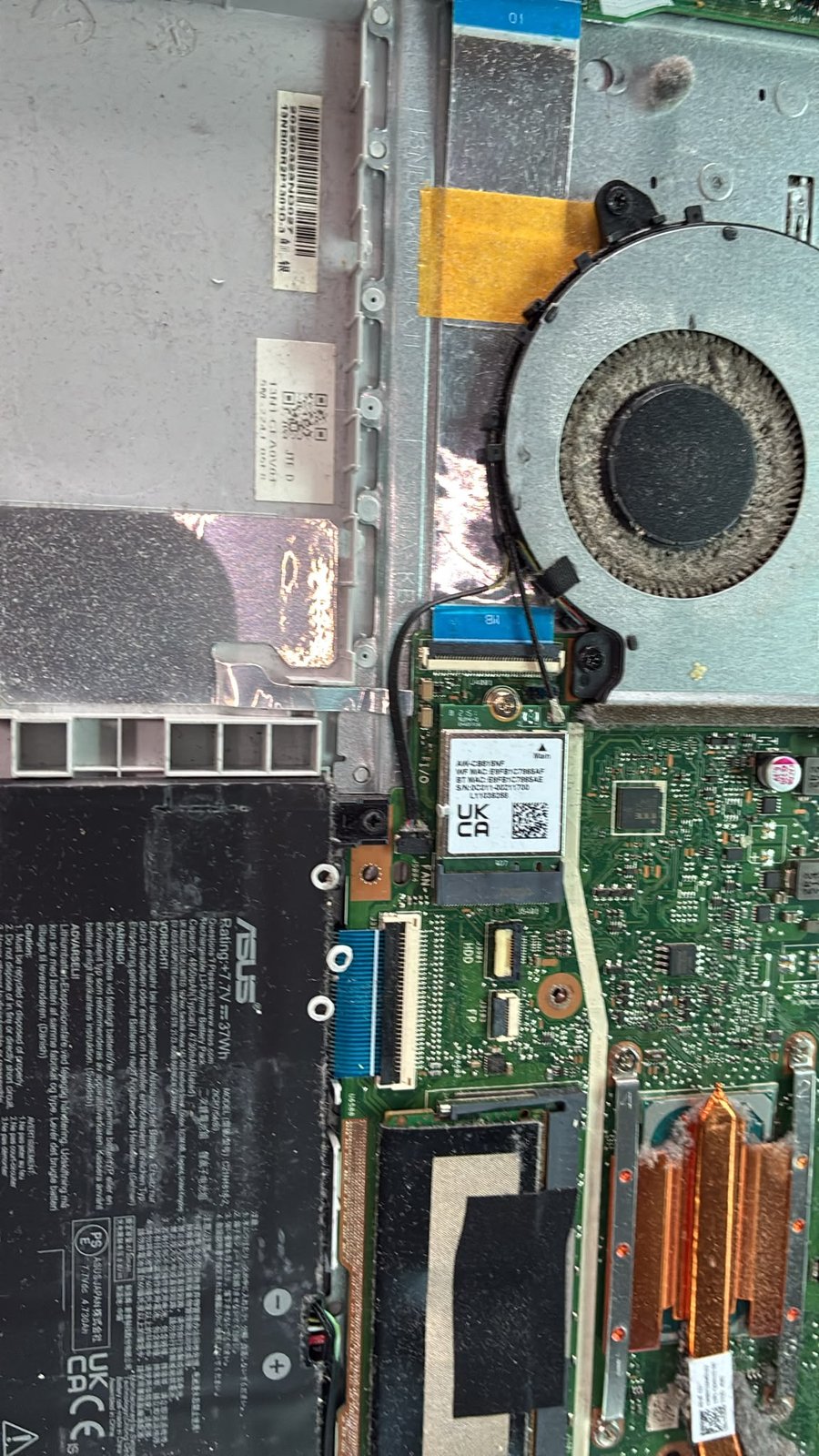 ASUS F515EA-EJ433W prima della pulizia con ventola impolverata e batteria da sostituire, cliente Cinisello Balsamo